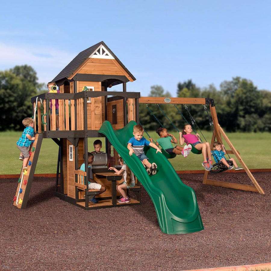 Backyard Discovery Canyon Creek Cedar Wood Swing Set with Wave Slide, Clubhouse, Play Kitchen, Picnic Area, Swings and Rock Wall